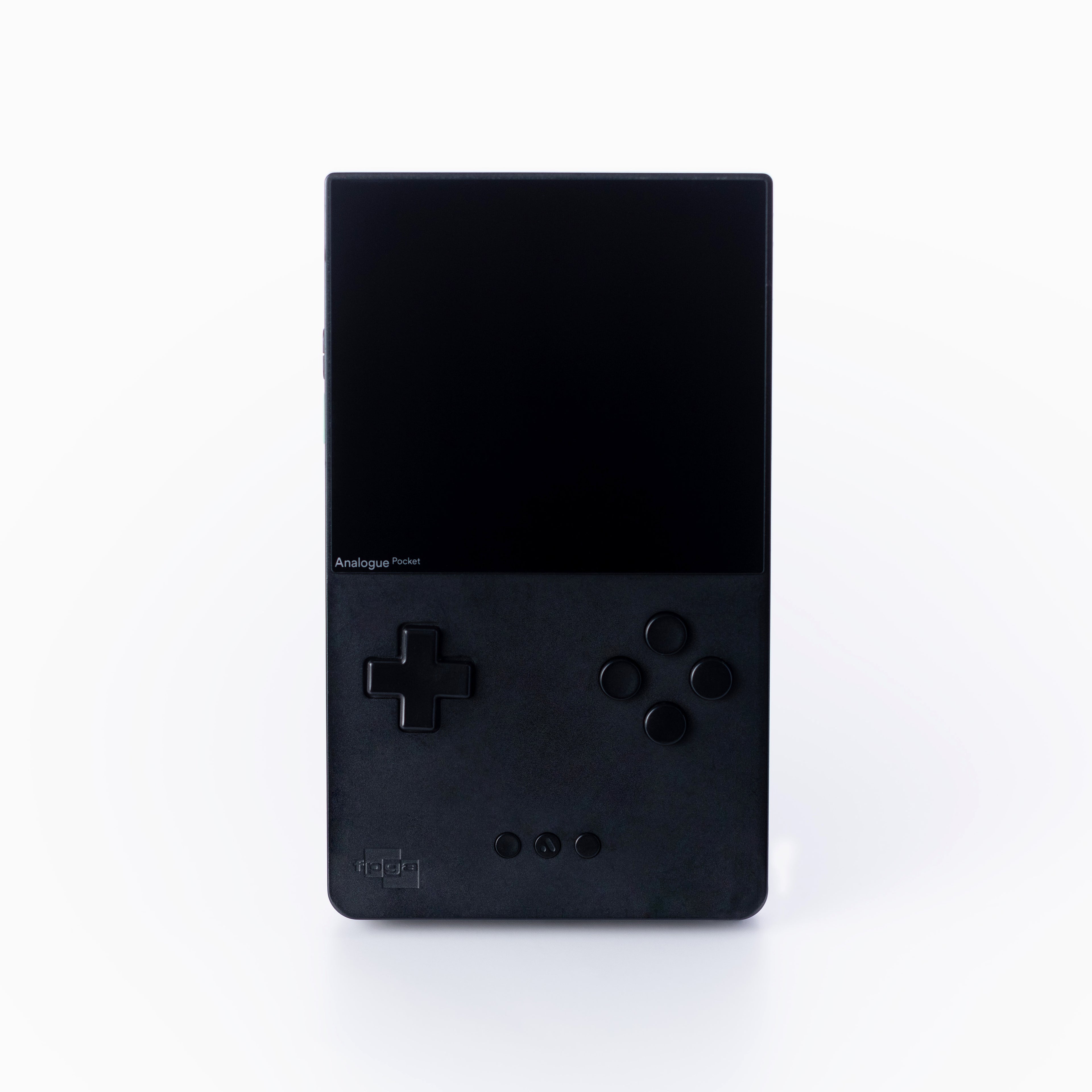 A black Analogue Pocket console standing vertically against a clean off white background.