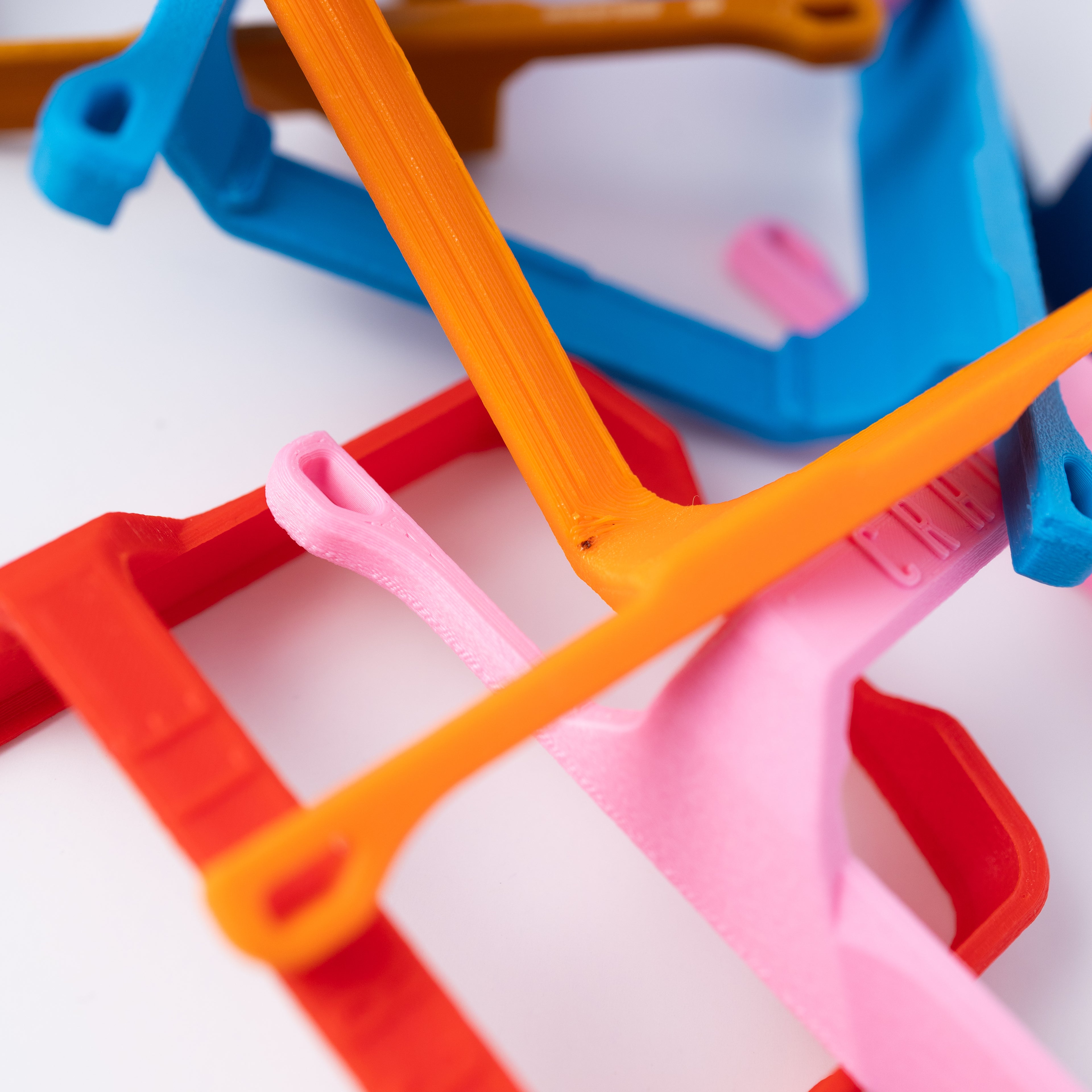 Example of a cosmetic blemish on a B-stock Cradle, such as a minor color contamination on an orange Cradle.