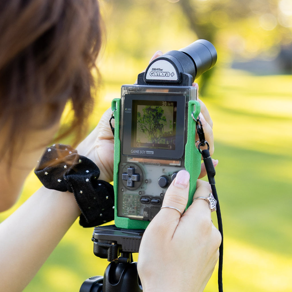 Close-up shot of a modified Game Boy Camera attached to a Game Boy Pocket inside a 3D-printed mount.