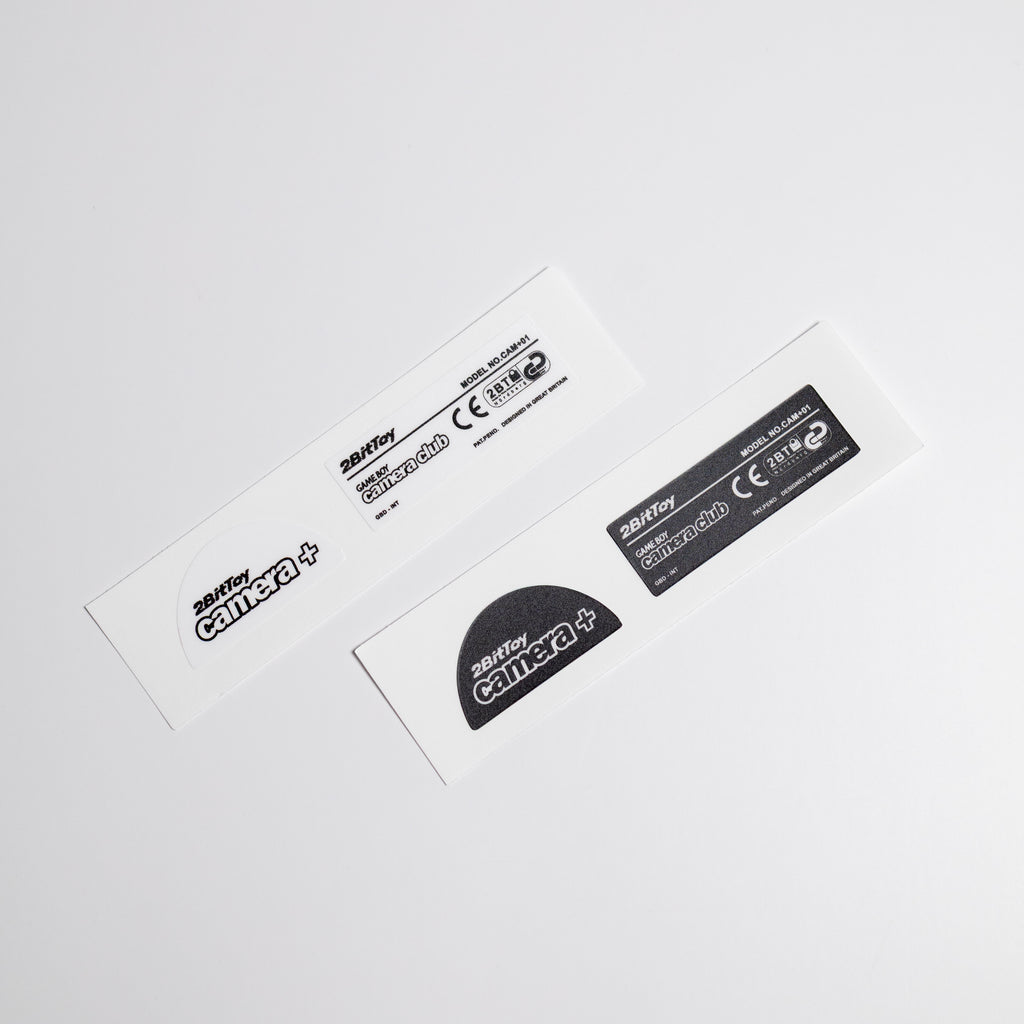 Set of black and white labels with branding on a white background